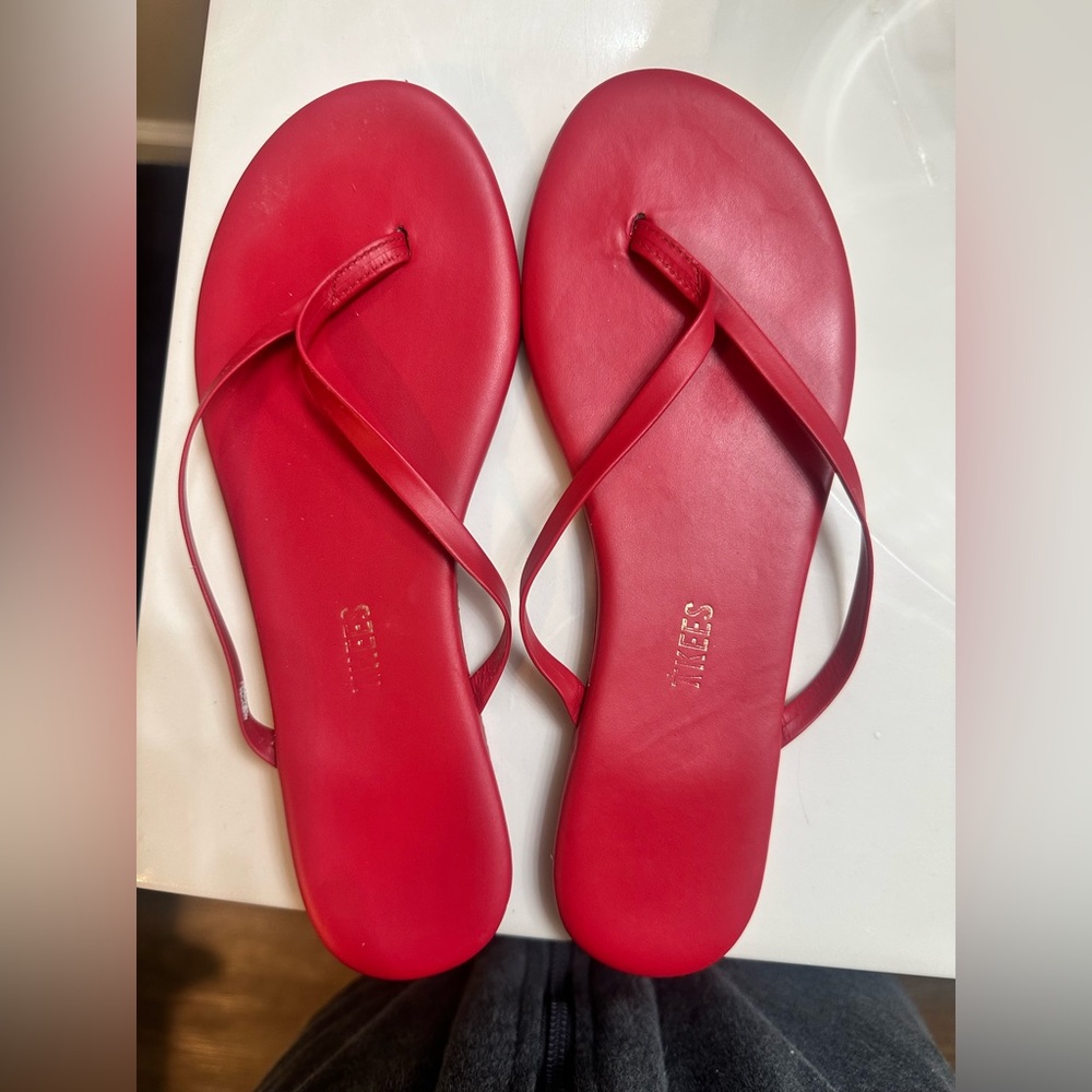 Like new red Tkees size 7. Have been worn twice.